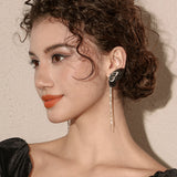 Noir Papillon Tassel Earrings