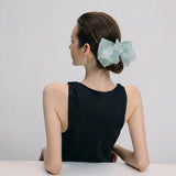 Celeste Luster Garden Bow Pin