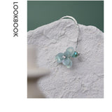 Celeste Luster Bloom Arc Earrings